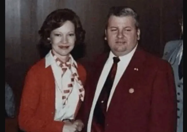 John Wayne Gacy and Rosalyn Carter shaking hands